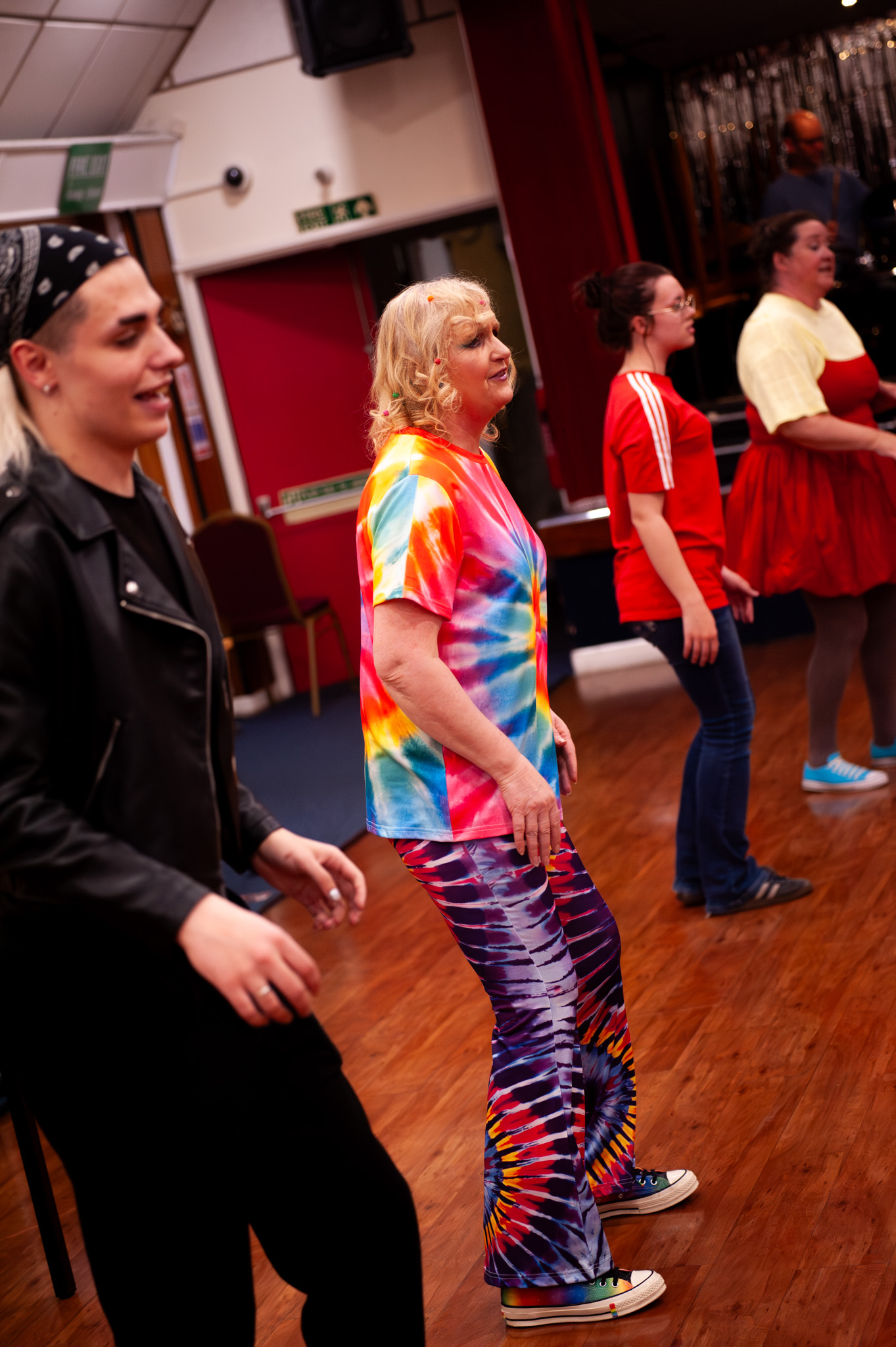 Company members rehearsing choreography together