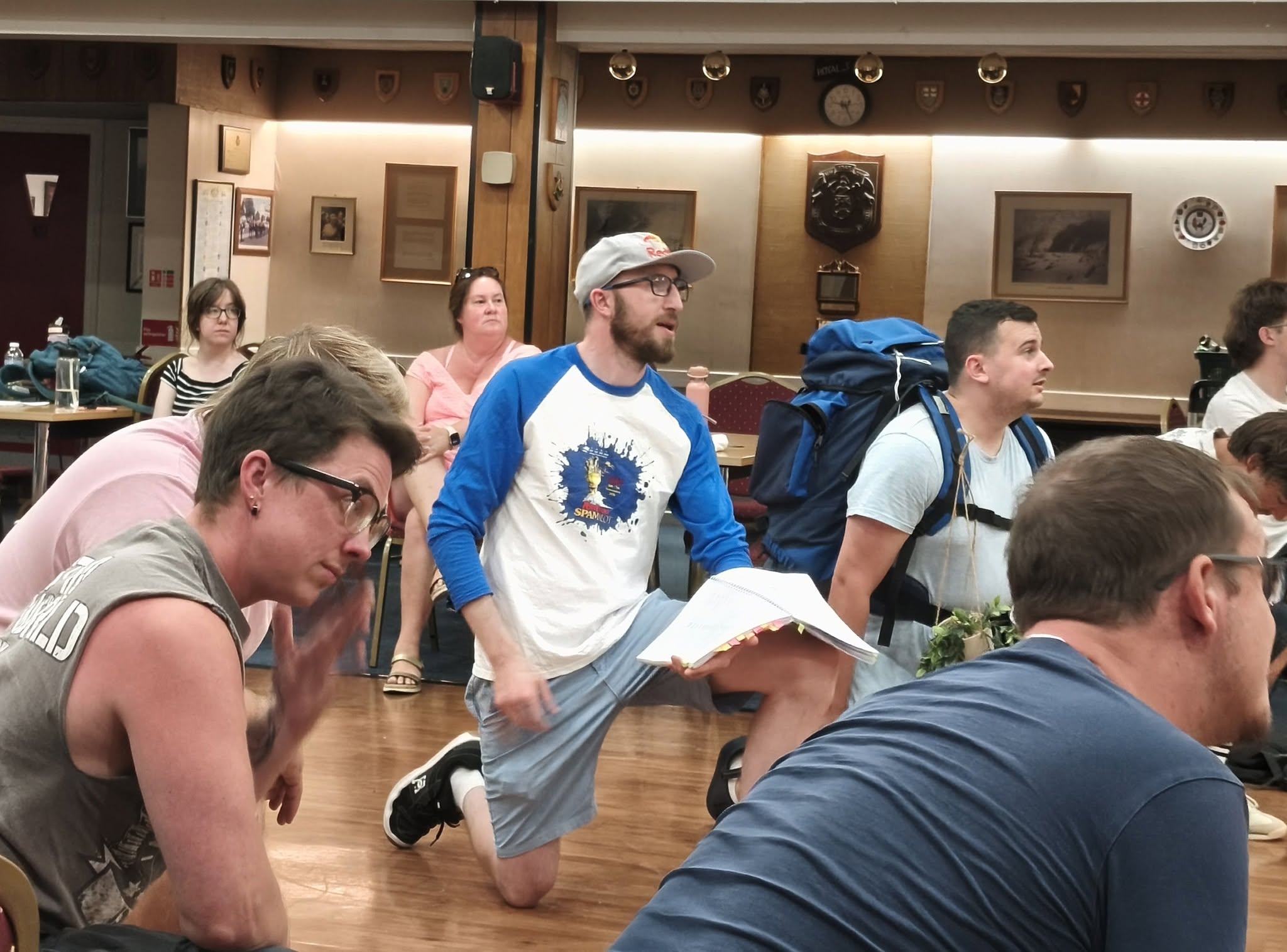 Company members rehearsing an ensemble scene